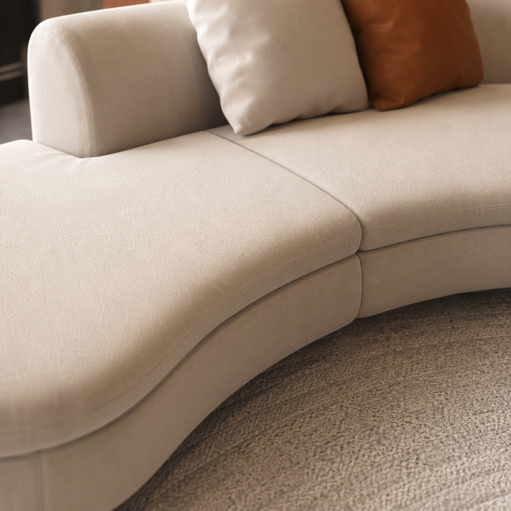 Close view of the seam where the two curved modules of the Abside Sofa meet