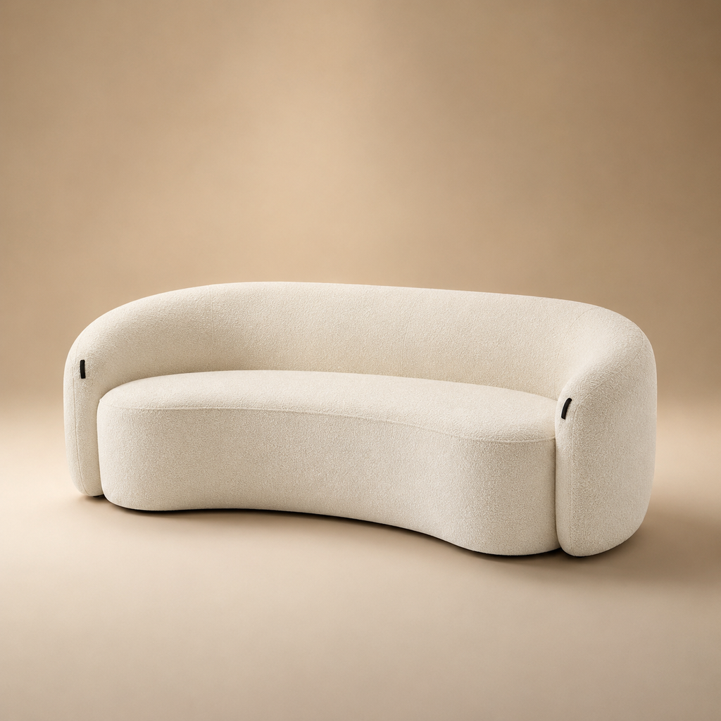 Anse Sofa from the other side, showing the black leather pull at the top of the arm