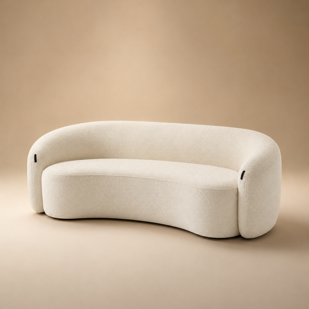 Anse Sofa from the other side, showing the black leather pull at the top of the arm