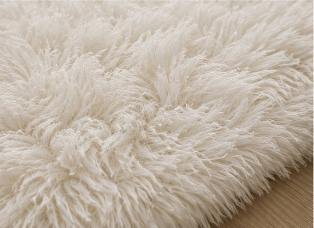 Close view of the Aveline Plush Rug's long, loose pile