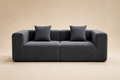 Basalte Sofa in charcoal, two blocks pushed together with rounded tube arms