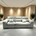 Brume Sofa in pale grey plush, three loose back cushions and two bolster arms laid on a low base