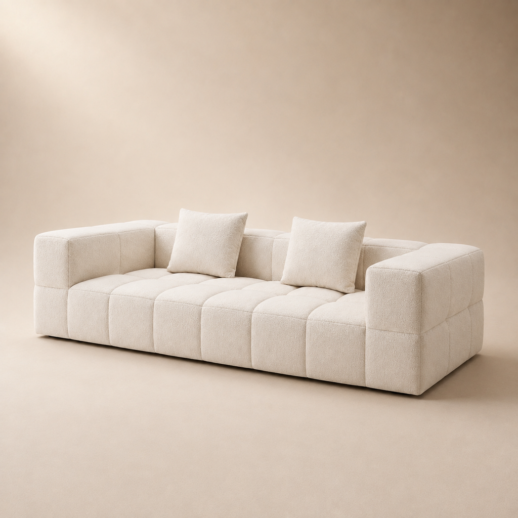 Bulle Sofa at an angle, the wide flat arms sitting lower than the back