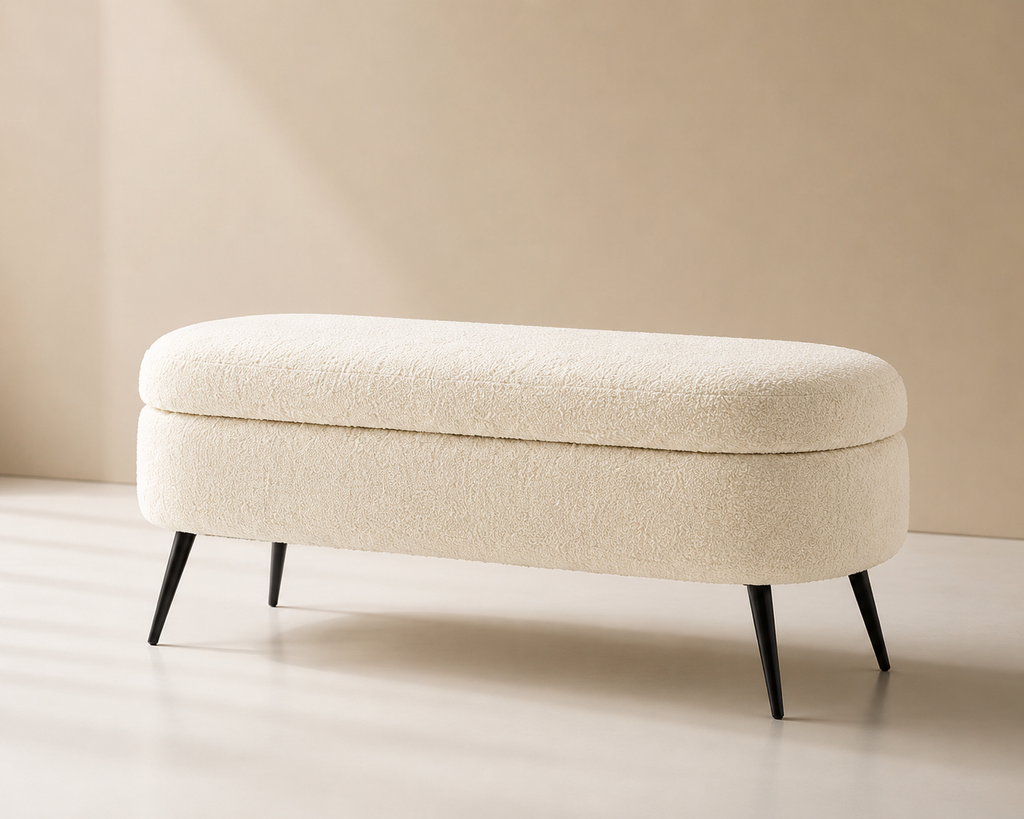 Cocon Bench seen at an angle, the lid seam running the length of the bouclé body