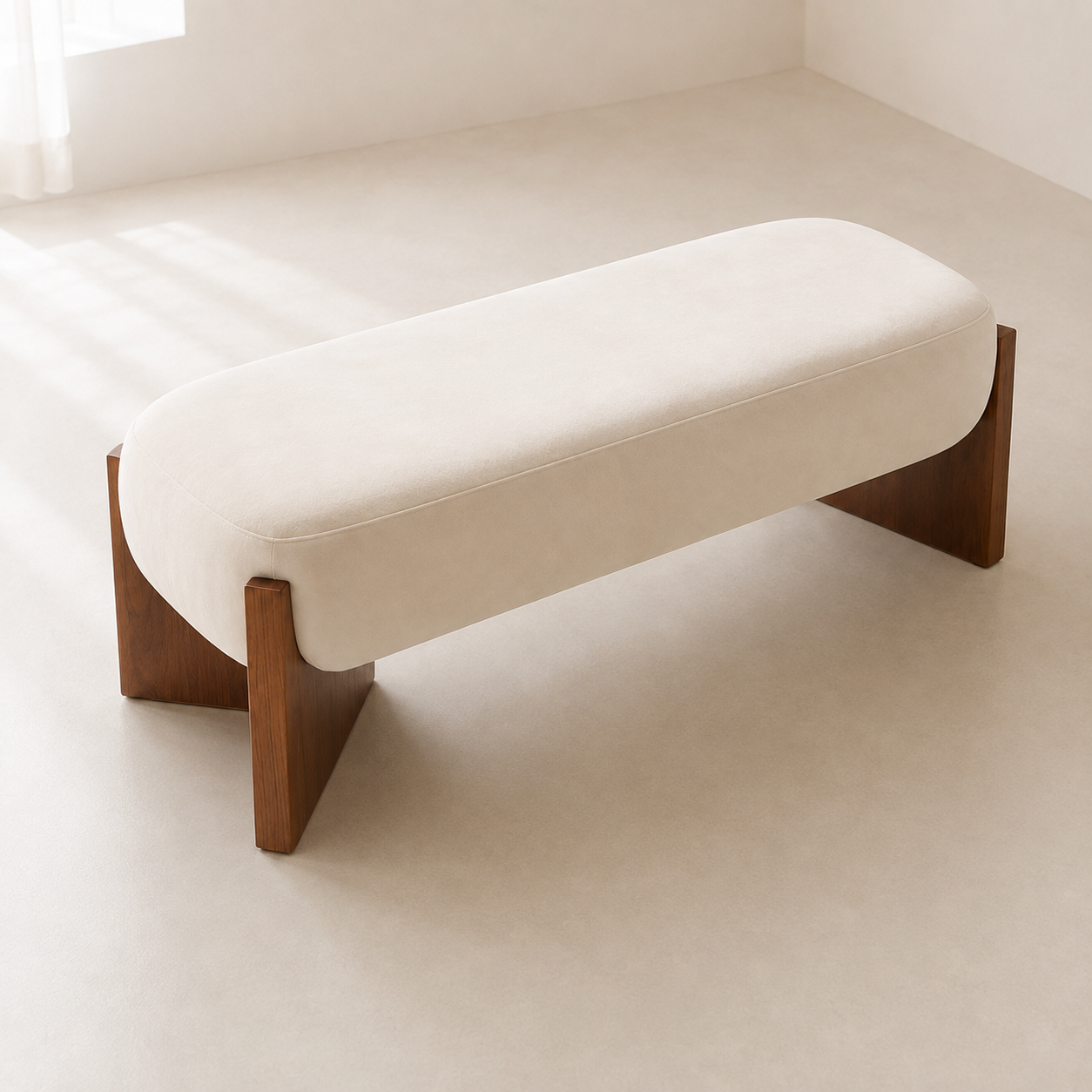 Ecrin Bench in cream, another view of the cushion and the walnut slab legs