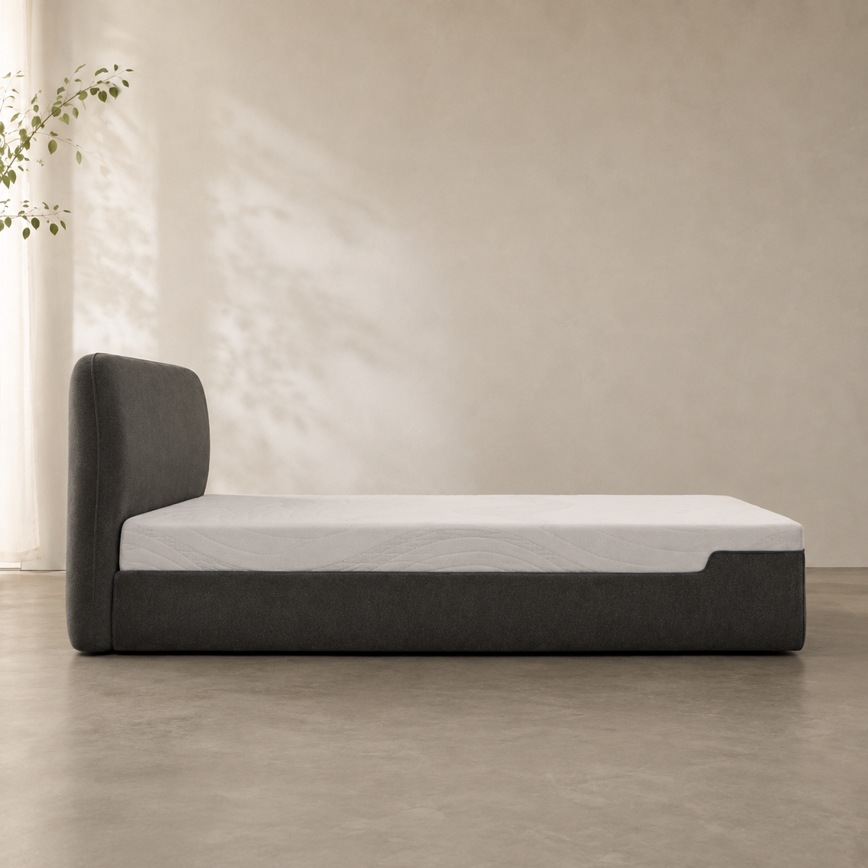 Liseré Bed in profile, showing how far the headboard leans back over the base