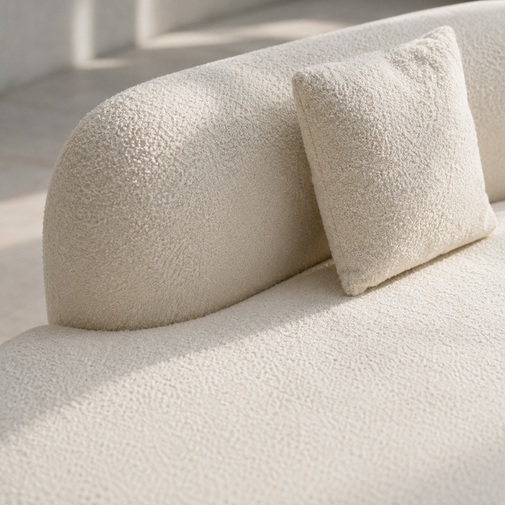 Close view of the Lune Sofa backrest, where the low back stops above the seat
