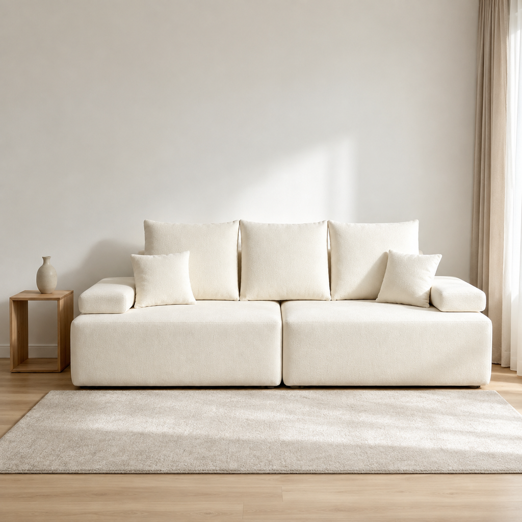 Massif Sofa in off-white bouclé, two blocks with loose bolster arms laid along the ends