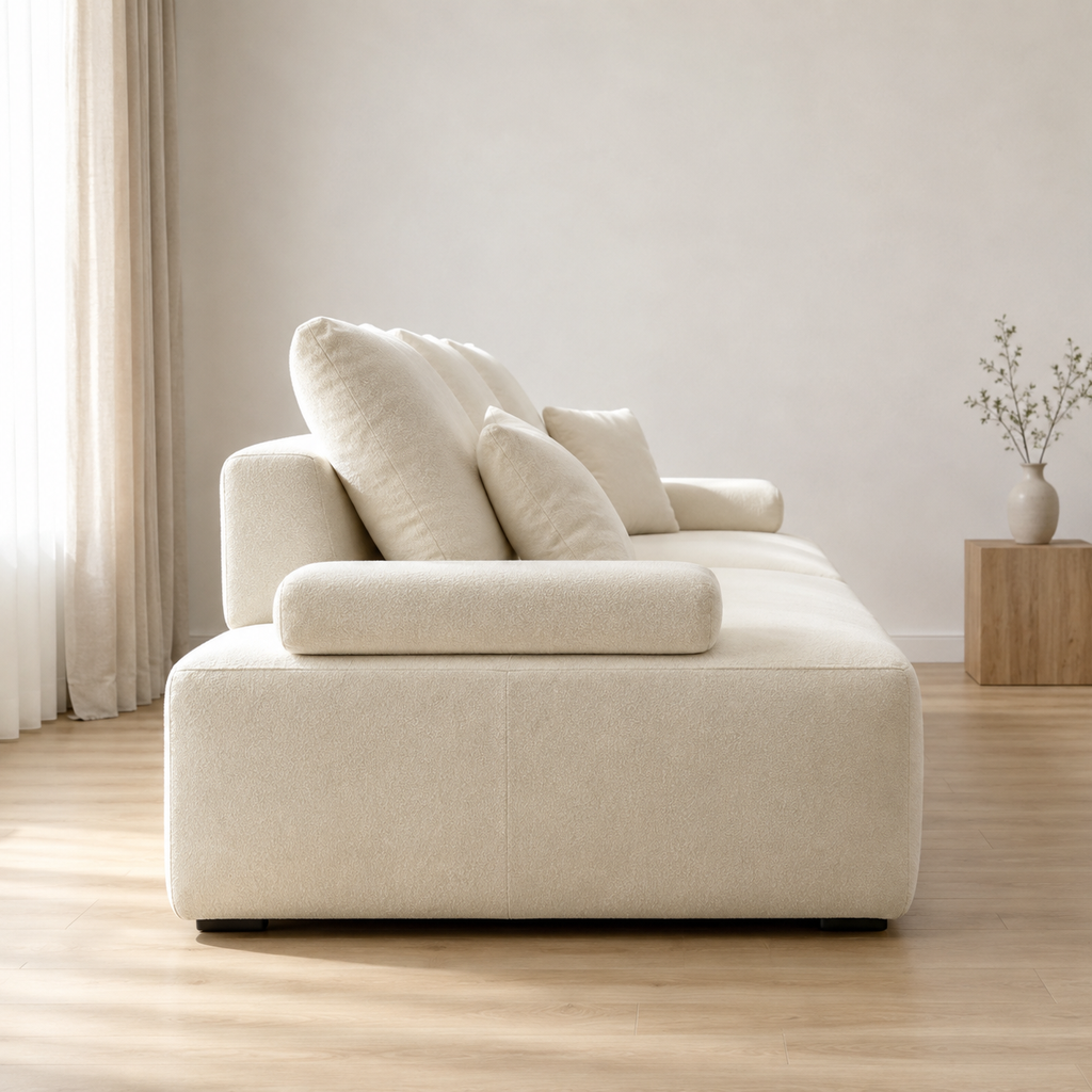 Massif Sofa from the side, the bolster arm resting on the block base
