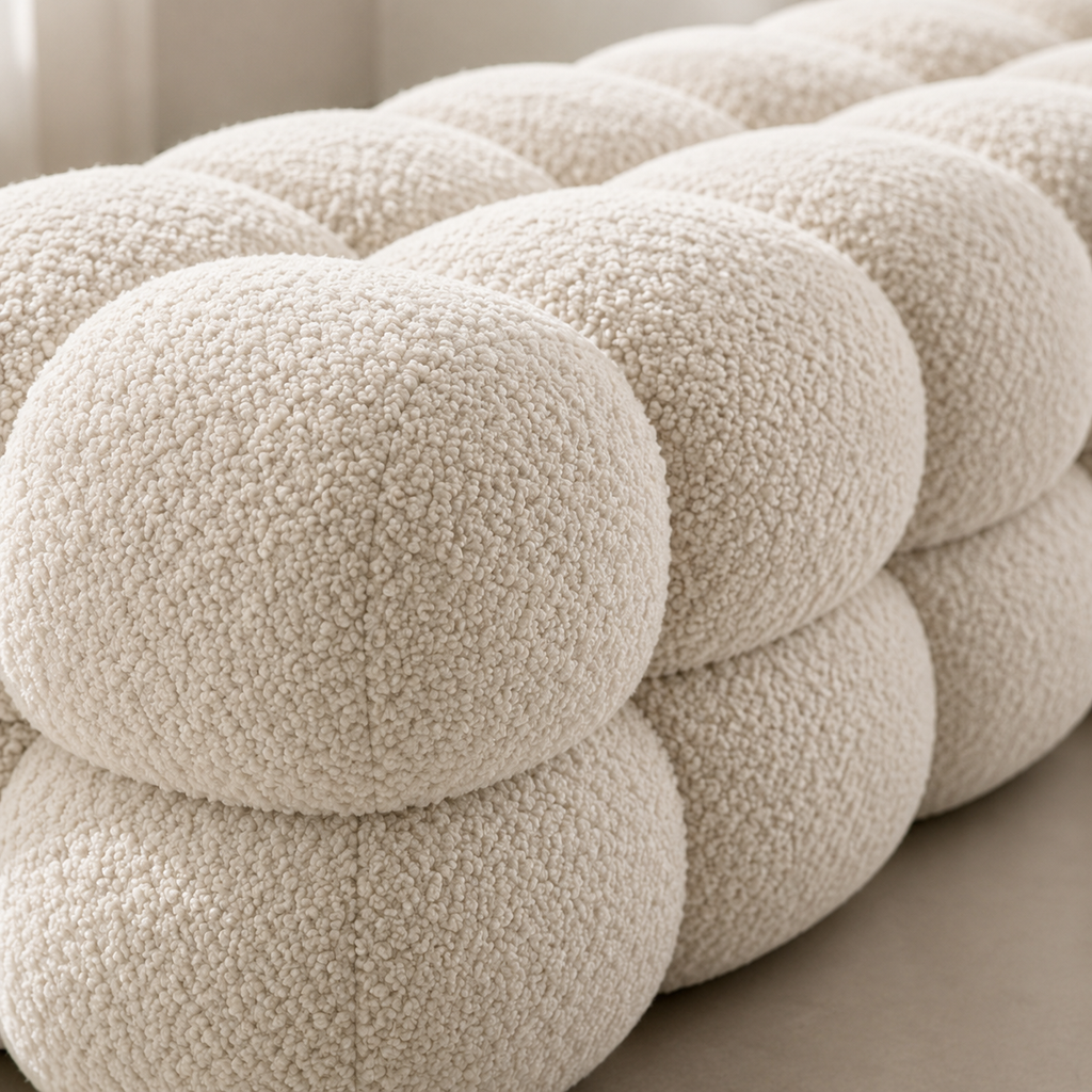 Close view of the seam running over each boucle sphere and the shadow where two rows meet