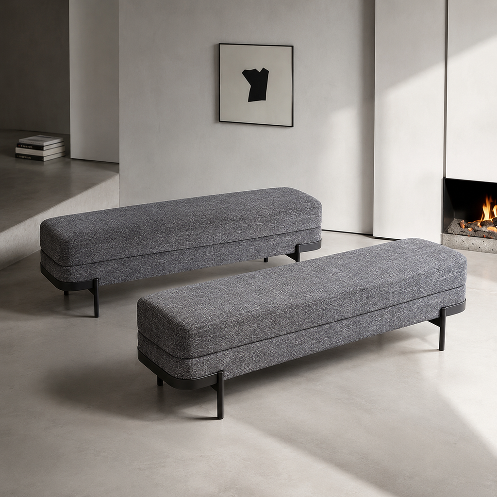 Two Perrin Benches placed back to back in a room with a framed drawing