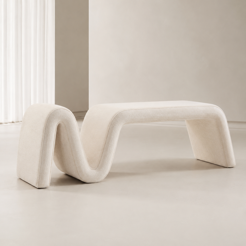 Ruban Bench in cream bouclé, one continuous folded band forming the seat, the fold and the legs