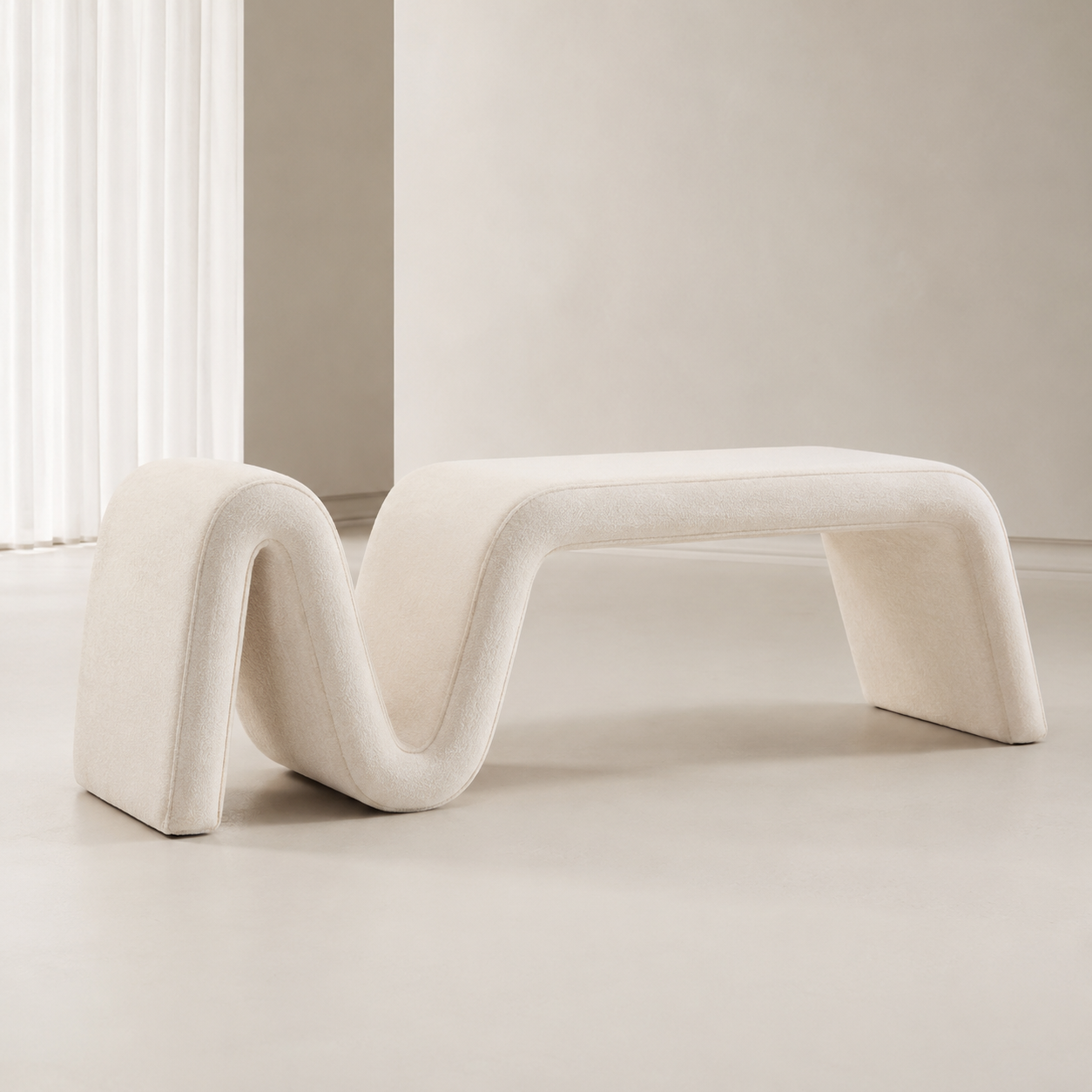 Ruban Bench in cream bouclé, one continuous folded band forming the seat, the fold and the legs