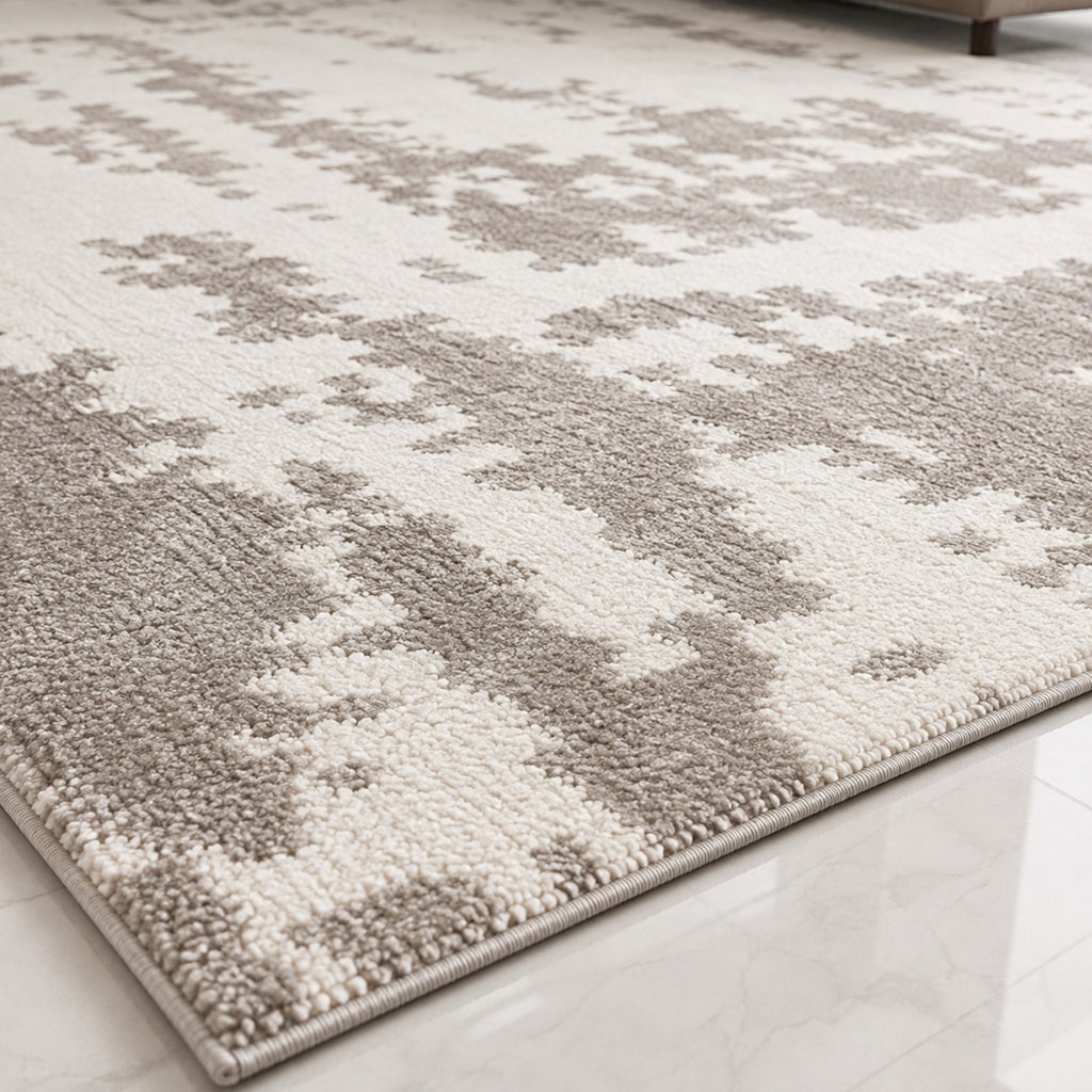 Close view of the Rylan Noble Rug showing the two pile heights and the bound edge