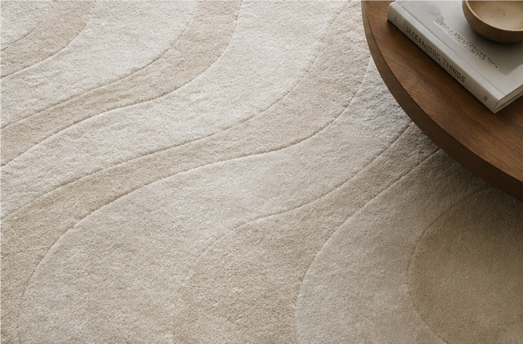 Close view of the Serein Rug's carved wave relief and dense hand-tufted pile