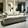 Sillon Sofa in sand corduroy, the wide ribs running along the base and up the arms