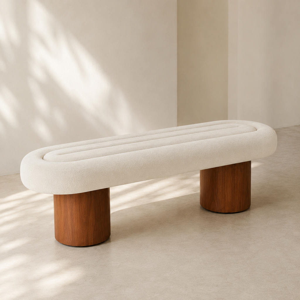 Tambour Bench in cream, the channelled oval seat carried on two solid wooden drums
