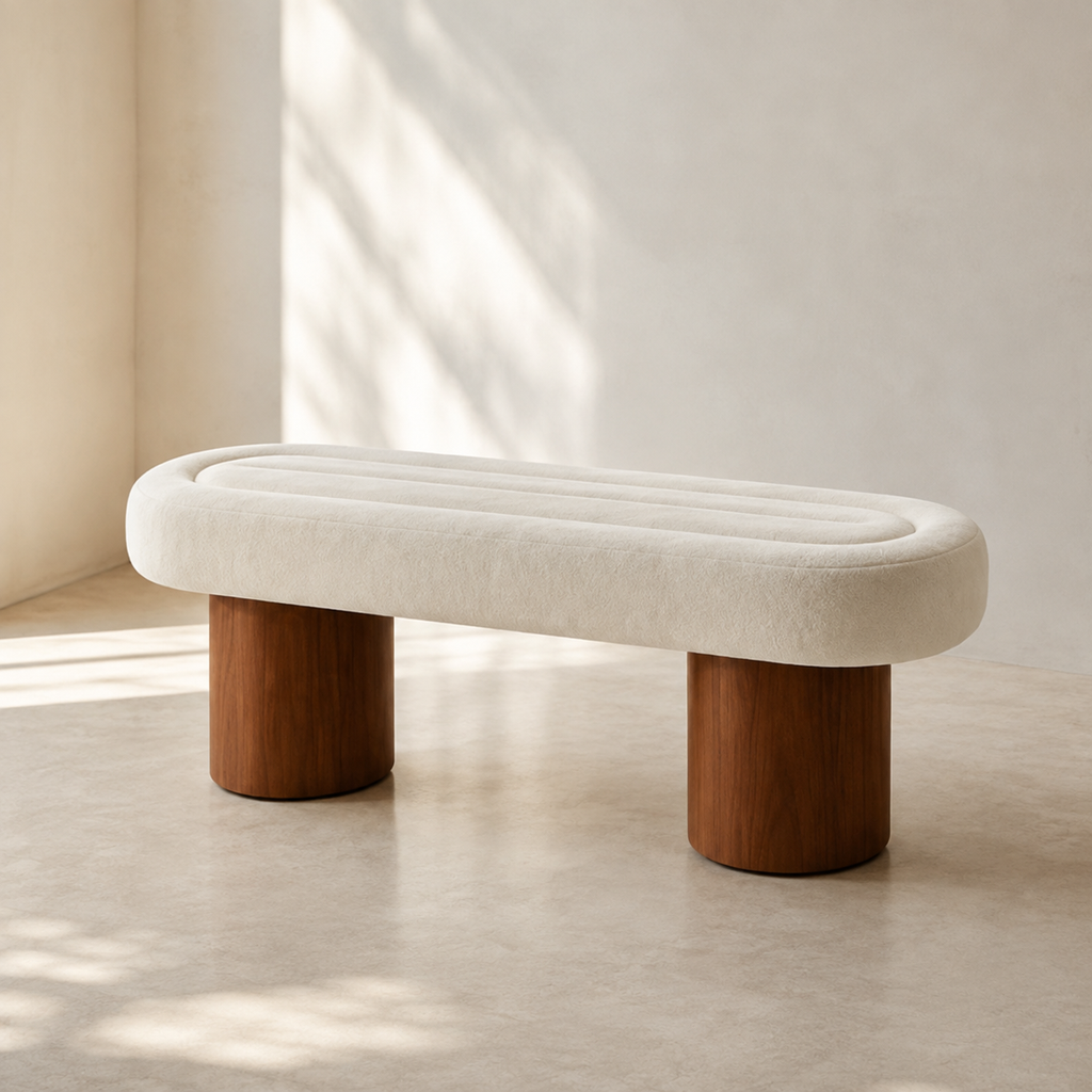 Tambour Bench seen in low afternoon light, the drums set inboard of the ends